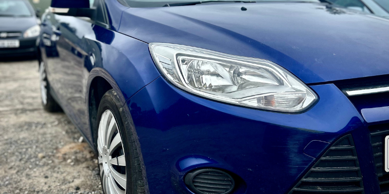 Older car without modern safety features in 2025