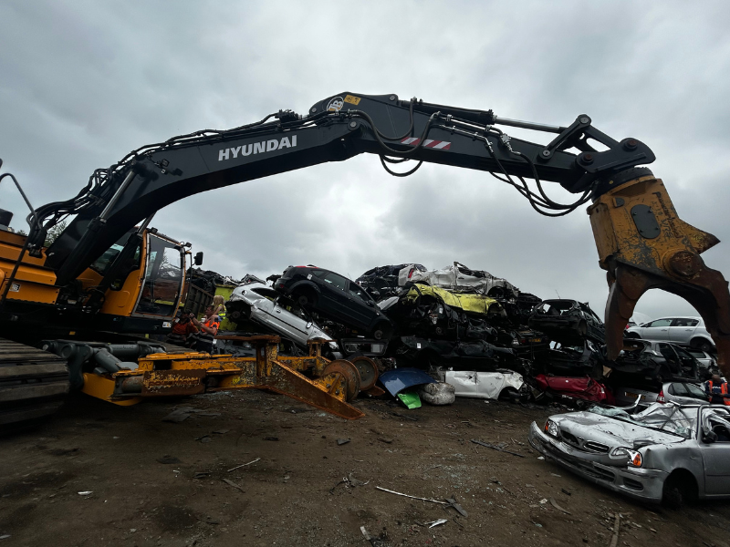 powerhand taking apart cars