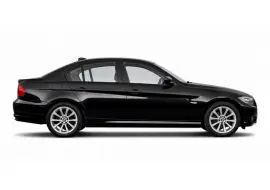 Black saloon car in side profile